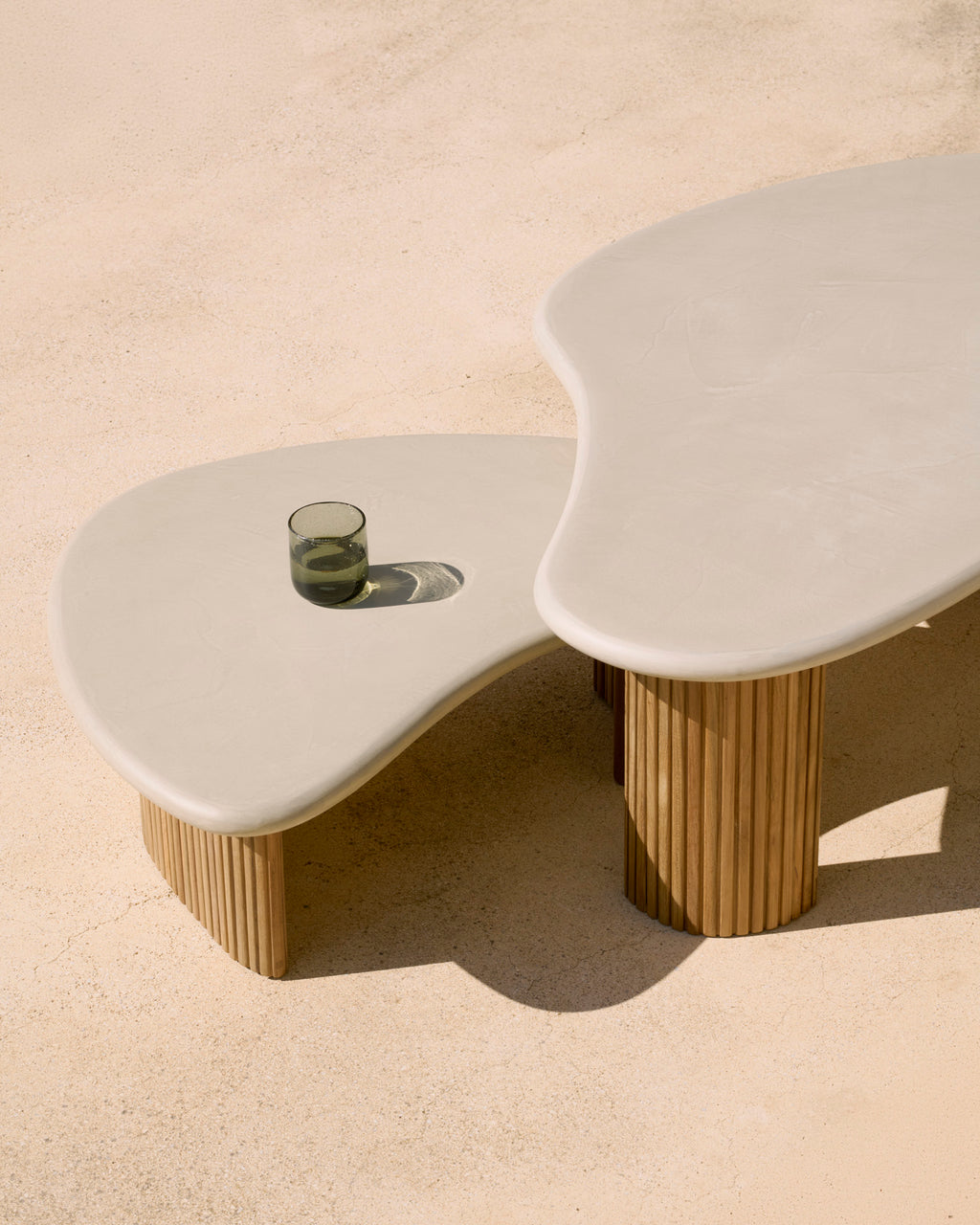 Boomerang Outdoor Coffee Table | Varnished Concrete Top | Reclaimed Teak Base | Light Grey | Pebble Shape | 35" X 24"