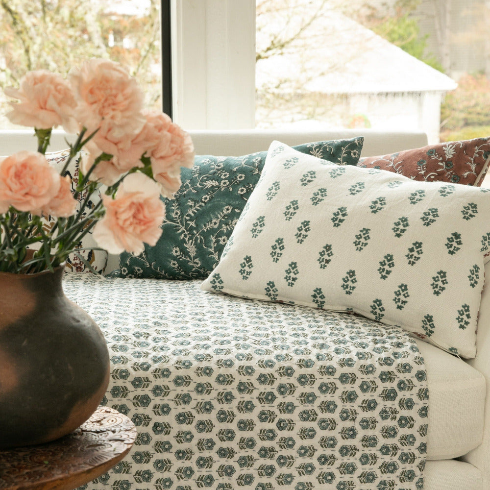 Sangeeta Teal on White Pillow