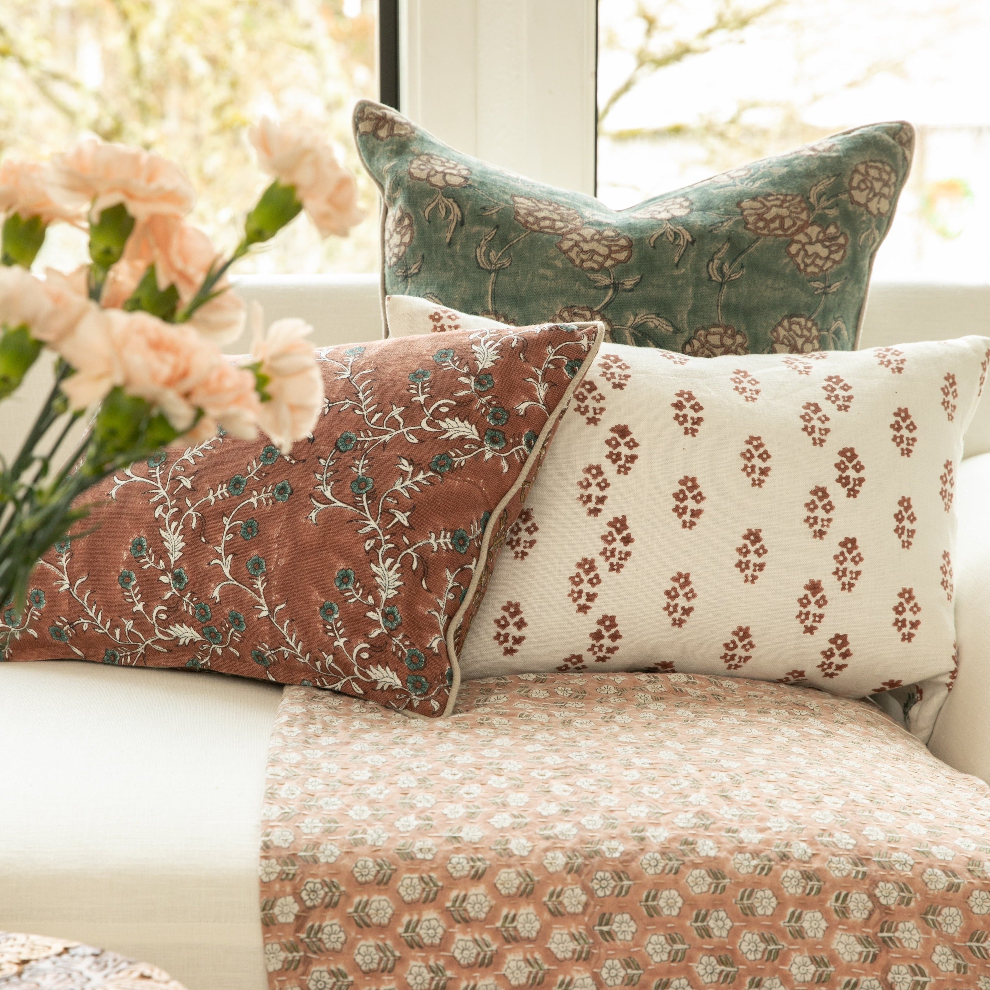 Sangeeta Saffron on White Pillow