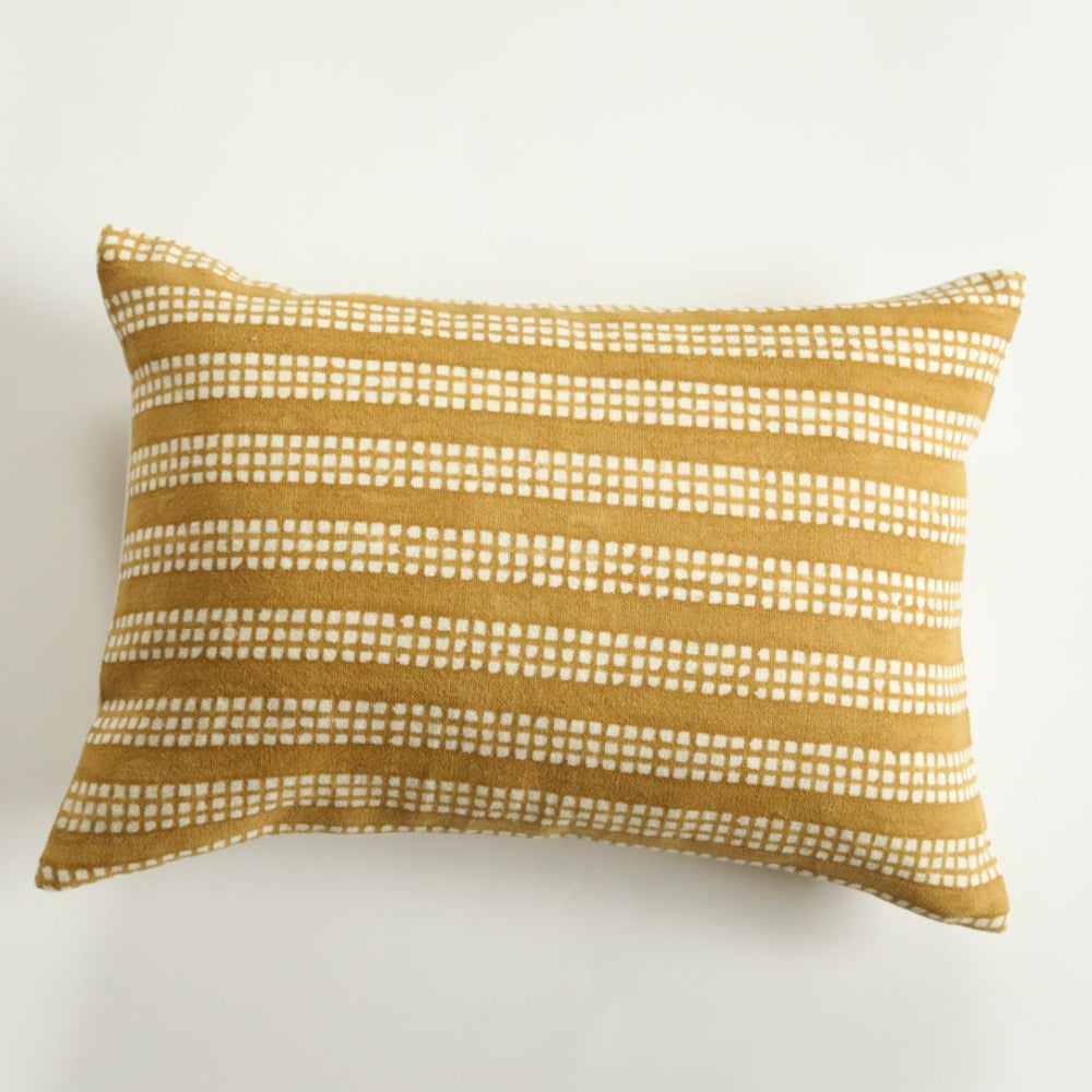 Nepsa Mustard on White Pillow