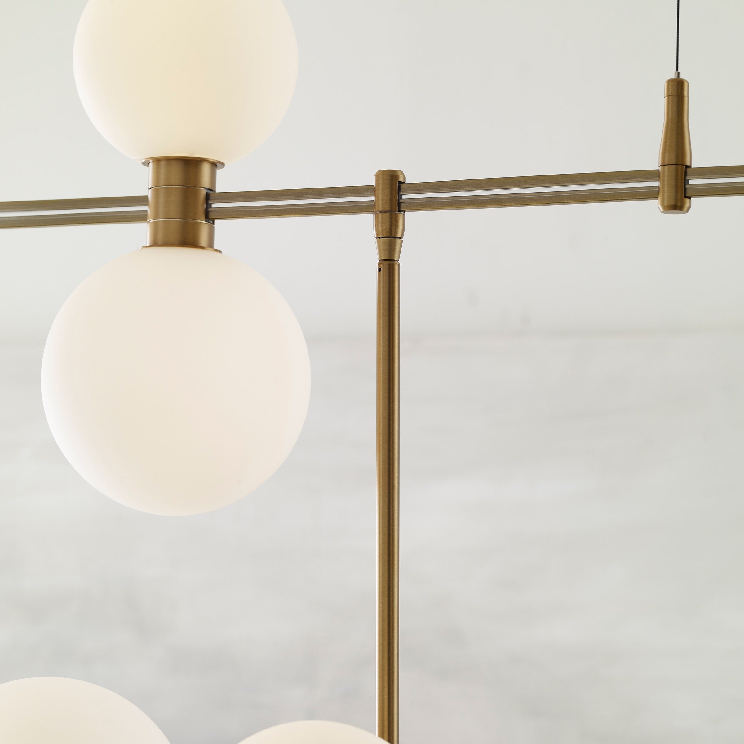 ModernRail Chandelier 2 Glass Orbs Aged Brass 3000K 90 CRI 24v surface canopy