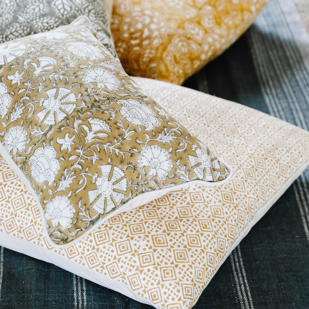 Nisa Mustard on White Pillow