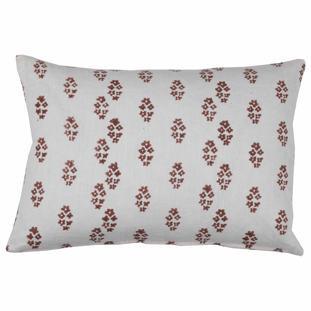 Sangeeta Saffron on White Pillow