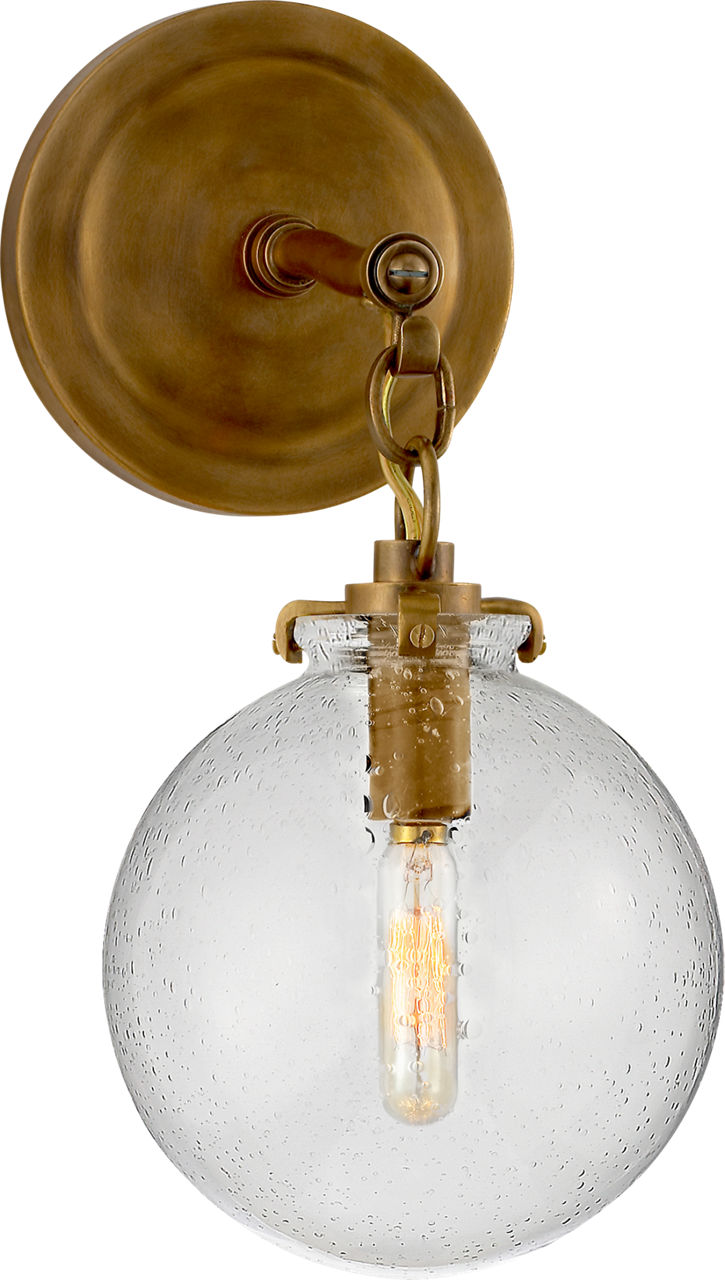 Katie Small Globe Sconce | Hand-Rubbed Antique Brass | Seeded Glass