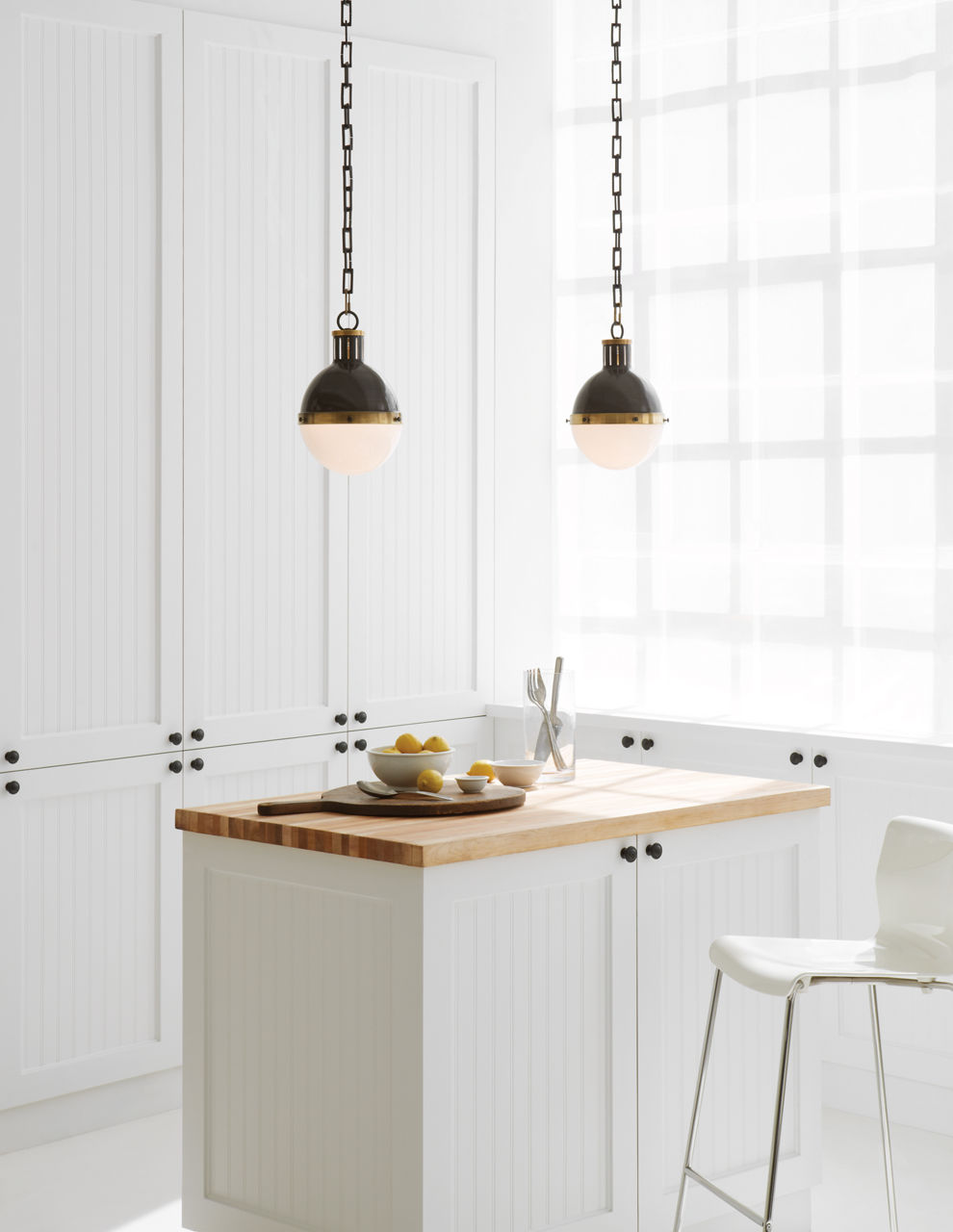 Hicks Small Pendant | Bronze and Hand-Rubbed Antique Brass | White Glass