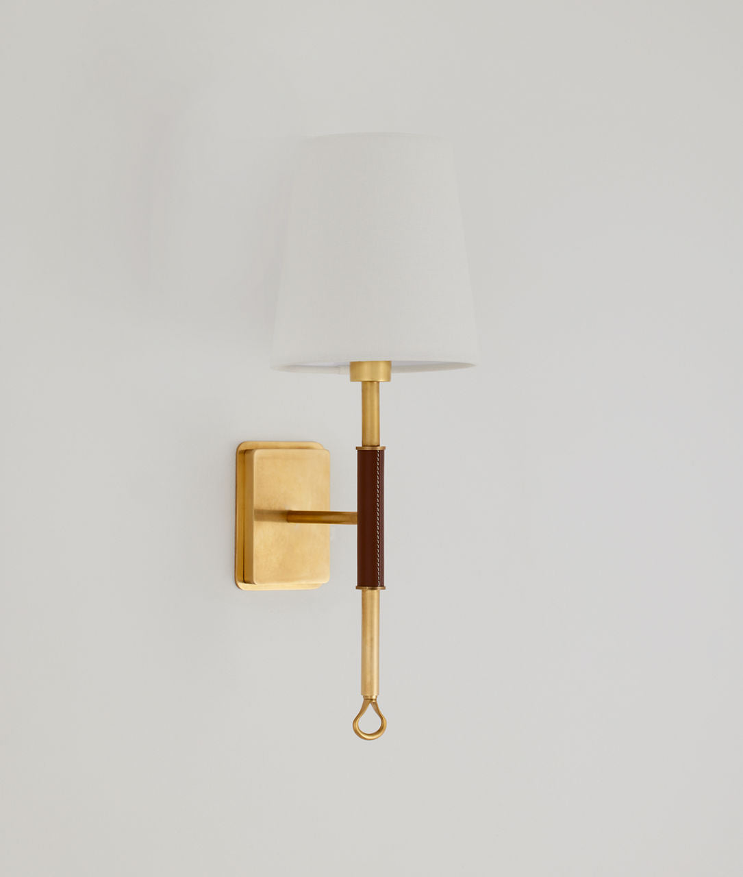 Griffin Sconce | Hand-Rubbed Antique Brass and Saddle Leather | Linen Shade