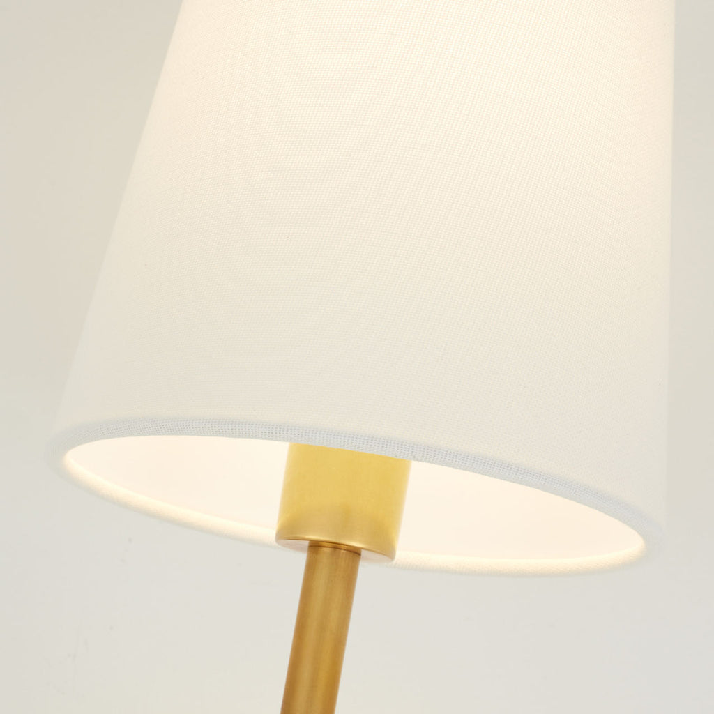 Griffin Sconce | Hand-Rubbed Antique Brass and Saddle Leather | Linen Shade