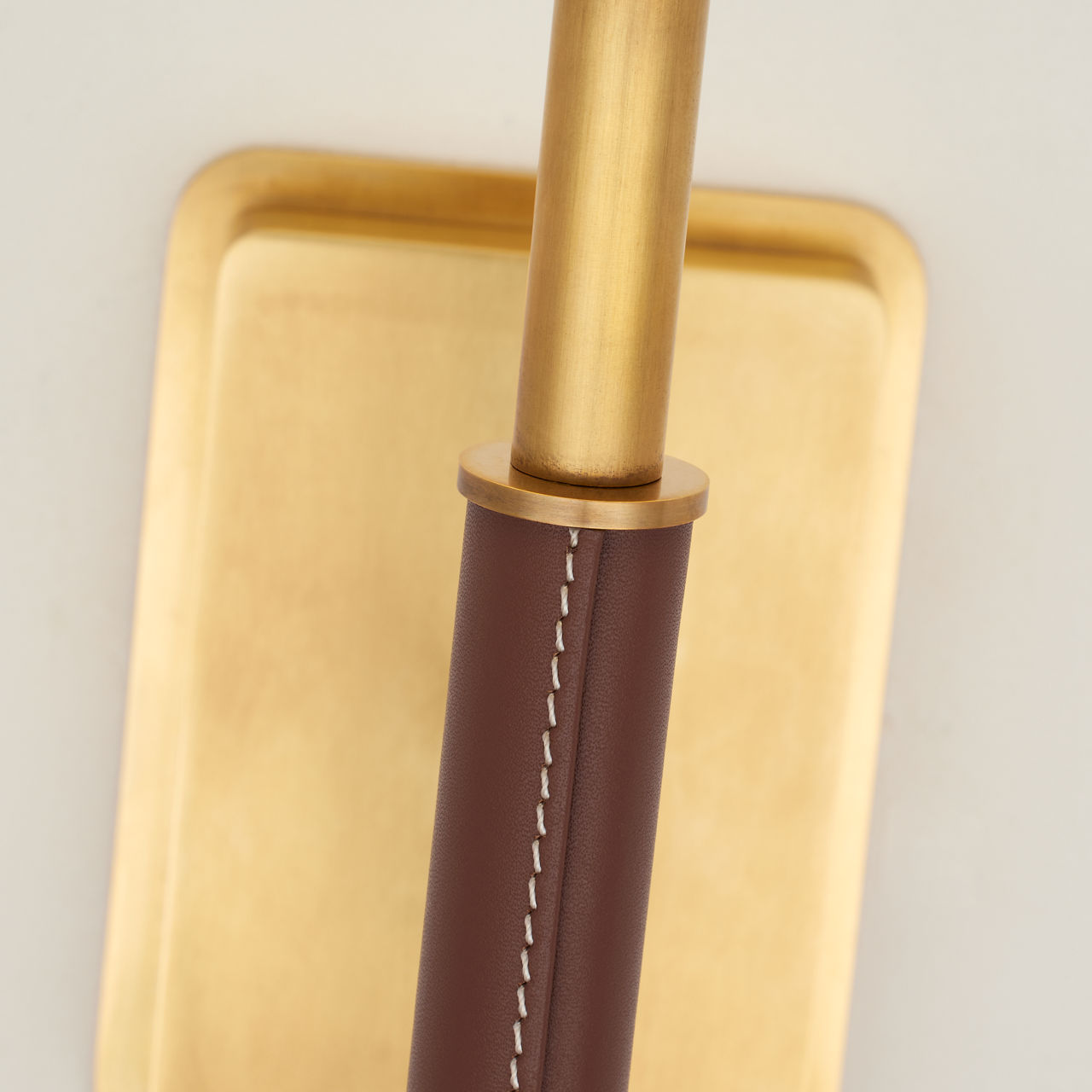 Griffin Sconce | Hand-Rubbed Antique Brass and Saddle Leather | Linen Shade
