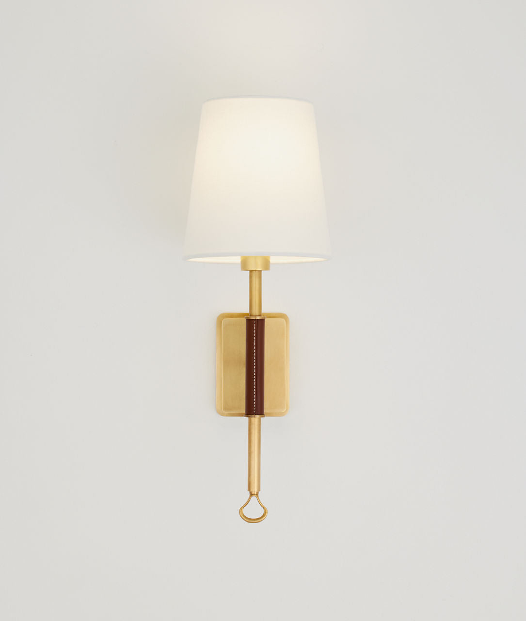 Griffin Sconce | Hand-Rubbed Antique Brass and Saddle Leather | Linen Shade