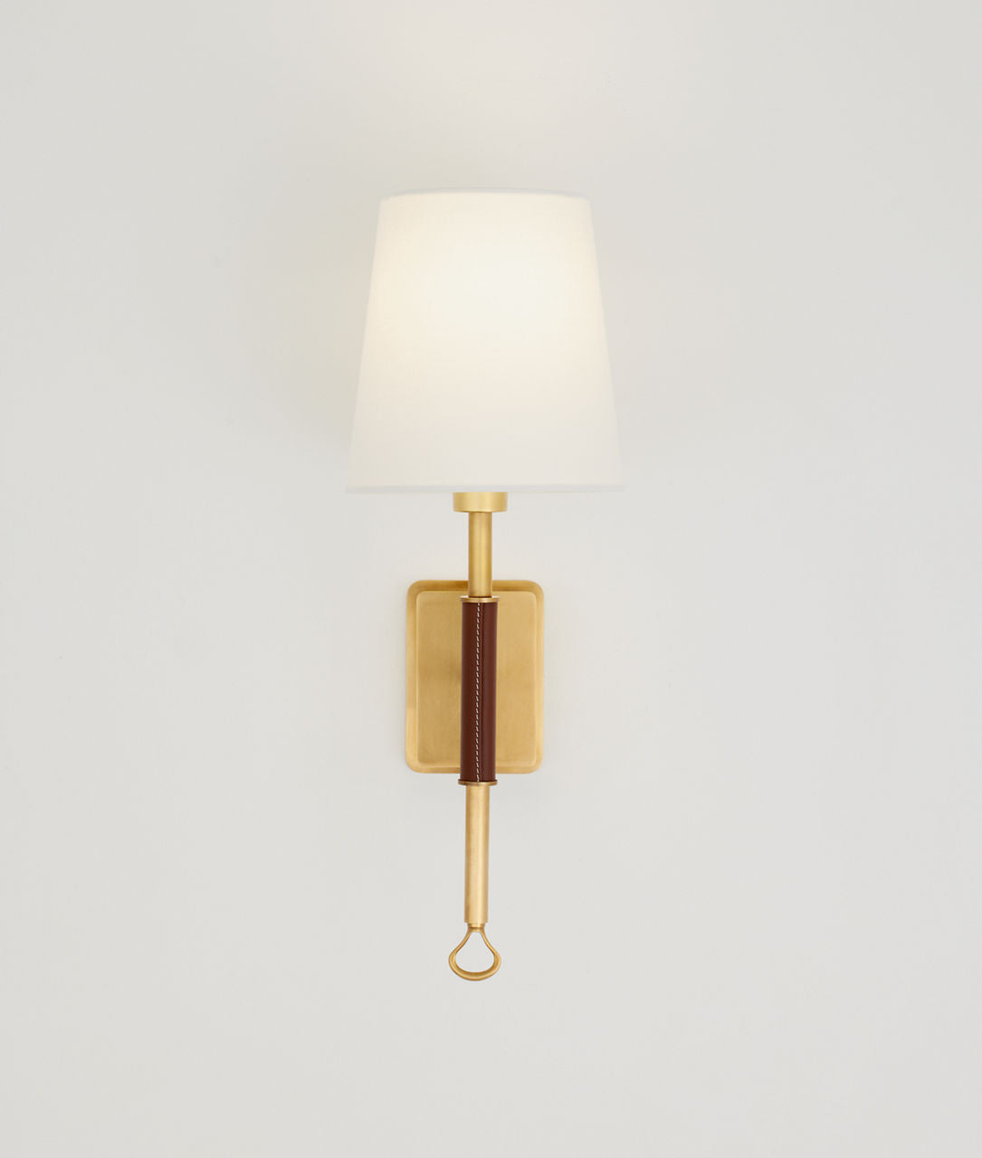 Griffin Sconce | Hand-Rubbed Antique Brass and Saddle Leather | Linen Shade