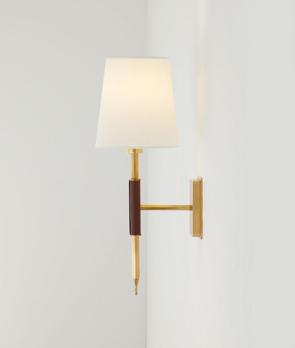 Griffin Sconce | Hand-Rubbed Antique Brass and Saddle Leather | Linen Shade