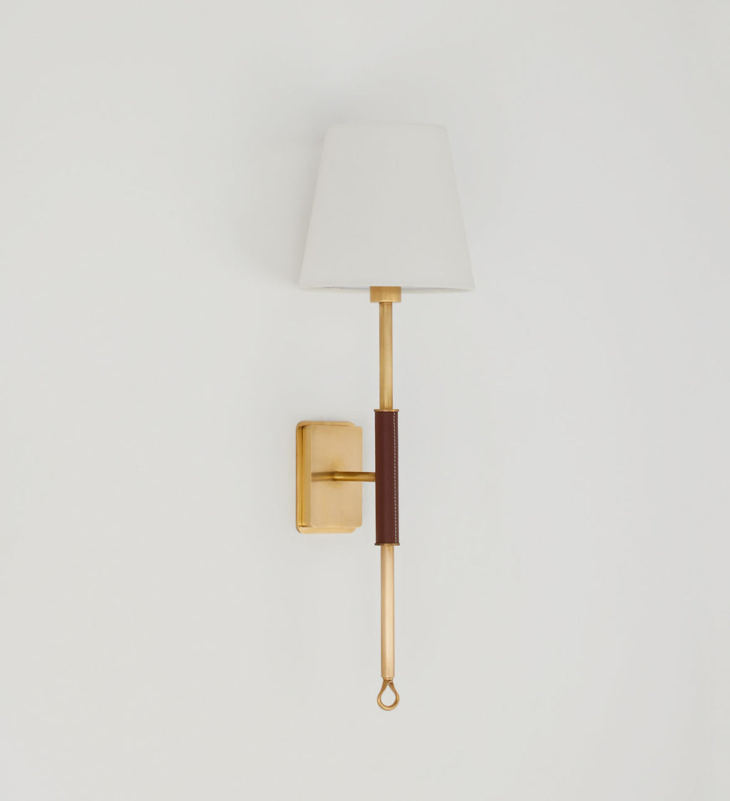Griffin Tail Sconce | Hand-Rubbed Antique Brass and Saddle Leather | Linen Shade