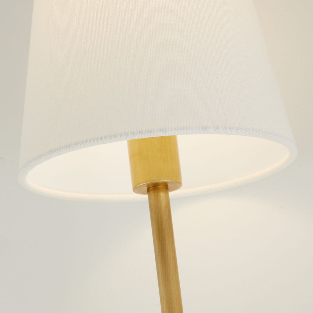 Griffin Tail Sconce | Hand-Rubbed Antique Brass and Saddle Leather | Linen Shade