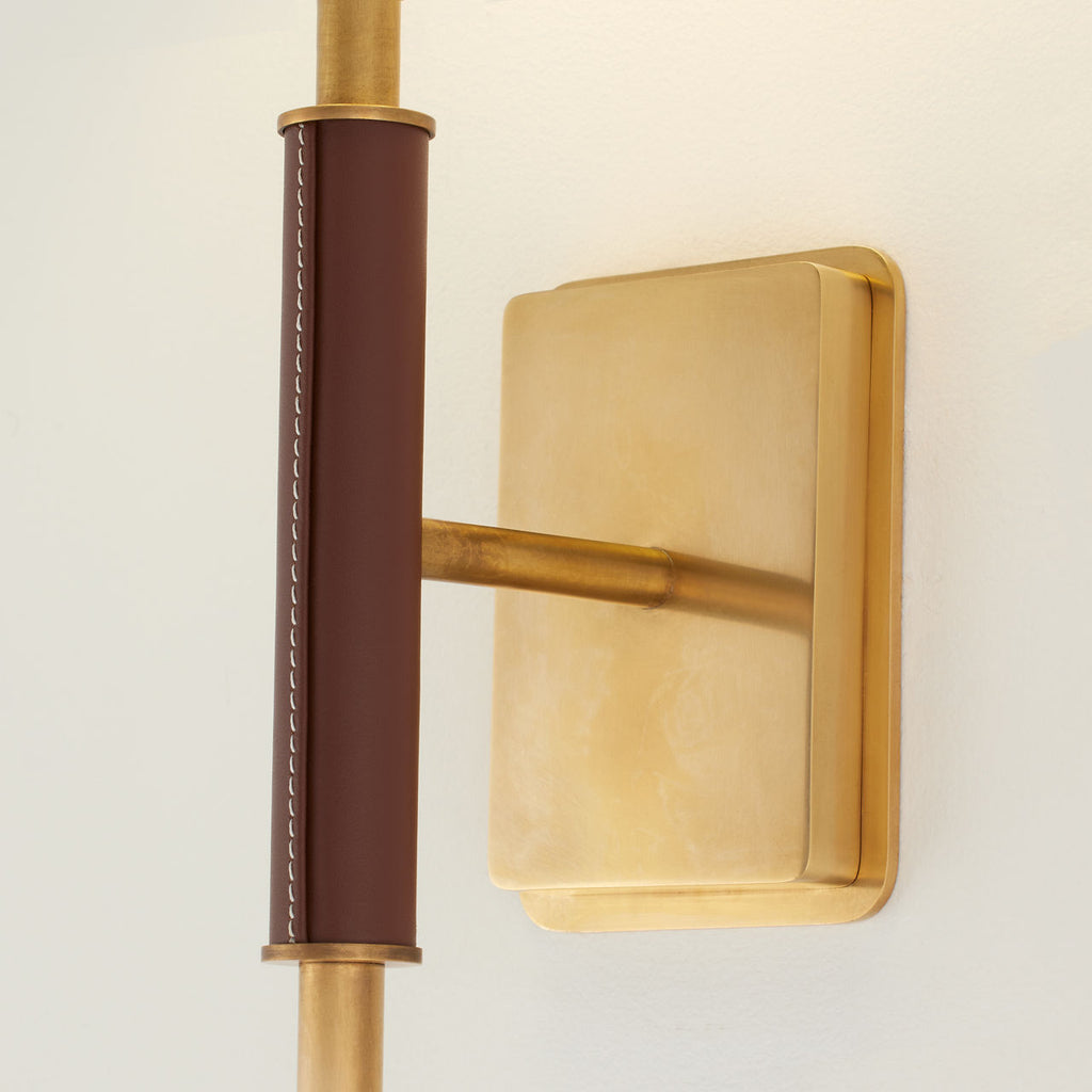 Griffin Tail Sconce | Hand-Rubbed Antique Brass and Saddle Leather | Linen Shade