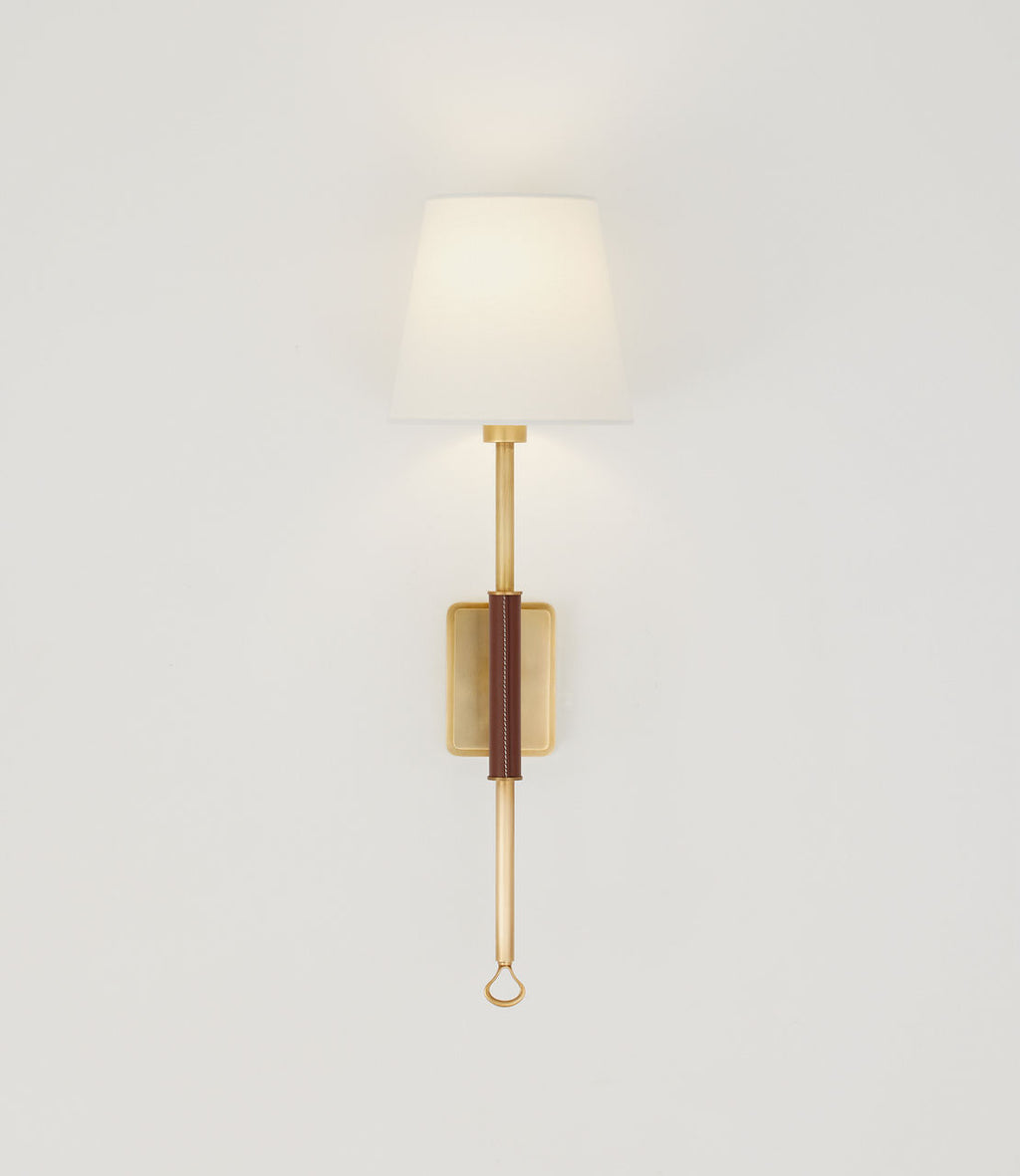 Griffin Tail Sconce | Hand-Rubbed Antique Brass and Saddle Leather | Linen Shade