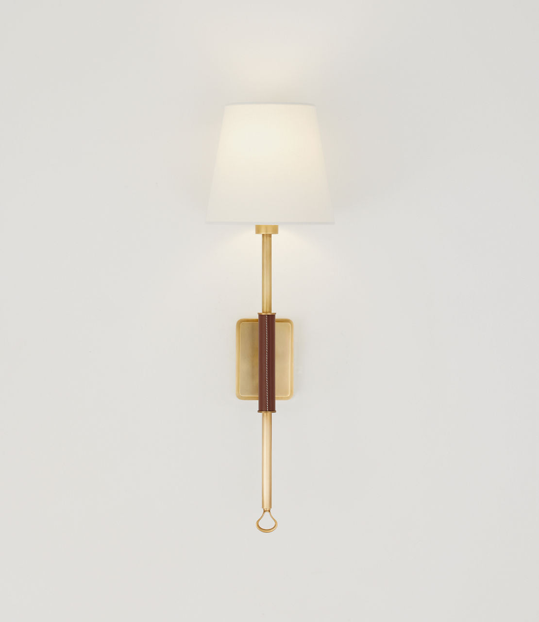 Griffin Tail Sconce | Hand-Rubbed Antique Brass and Saddle Leather | Linen Shade