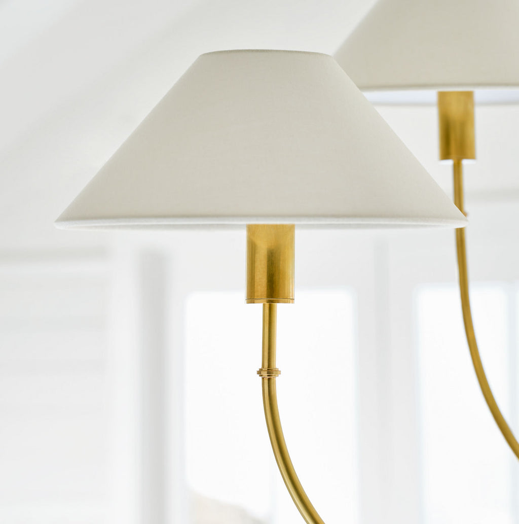 Griffin Large Staggered Tail Chandelier | Hand-Rubbed Antique Brass and Saddle Leather | Linen Shades