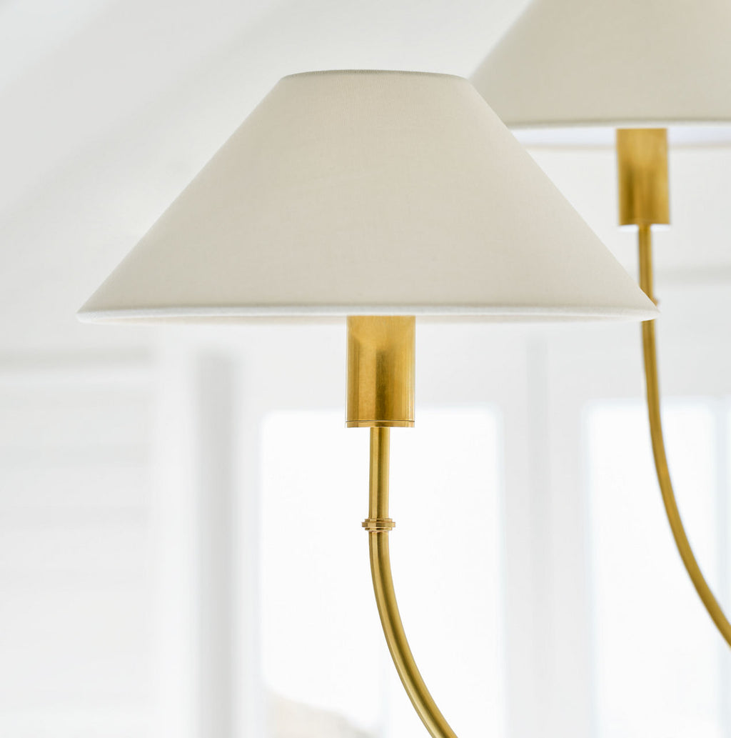 Griffin Large Staggered Tail Chandelier | Hand-Rubbed Antique Brass and Saddle Leather | Linen Shades