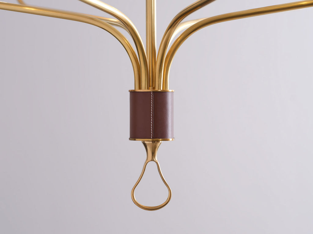 Griffin Grande Tail Chandelier | Hand-Rubbed Antique Brass and Saddle Leather | Linen Shades
