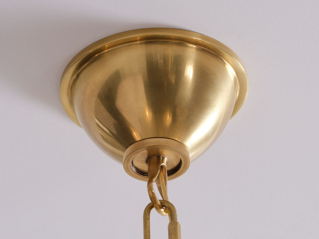 Griffin Grande Tail Chandelier | Hand-Rubbed Antique Brass and Saddle Leather | Linen Shades