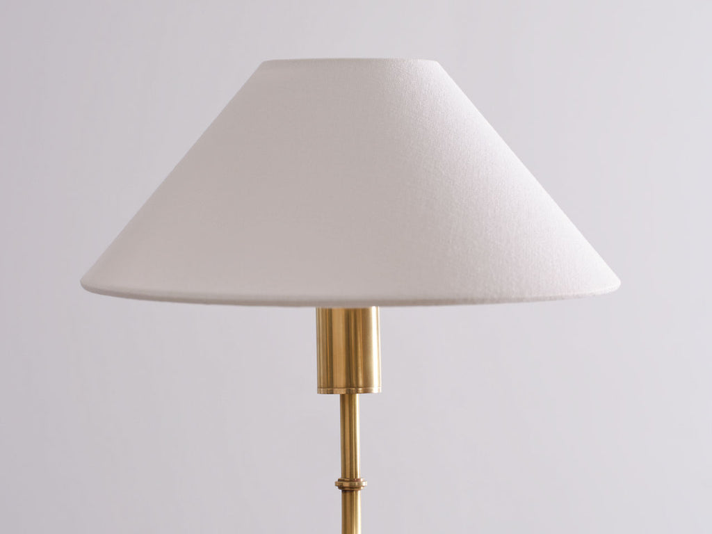 Griffin Grande Tail Chandelier | Hand-Rubbed Antique Brass and Saddle Leather | Linen Shades