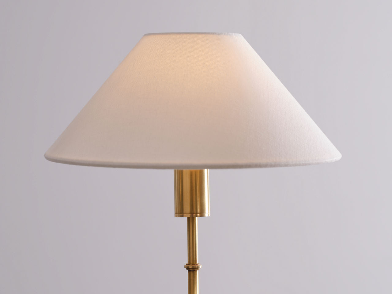 Griffin Grande Tail Chandelier | Hand-Rubbed Antique Brass and Saddle Leather | Linen Shades