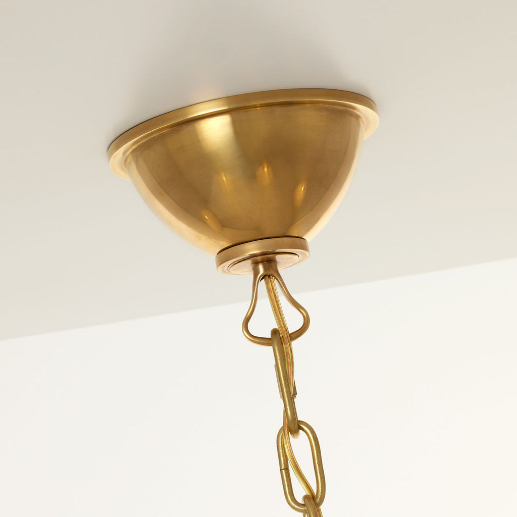 Griffin Grande Tail Chandelier | Hand-Rubbed Antique Brass and Saddle Leather | Linen Shades