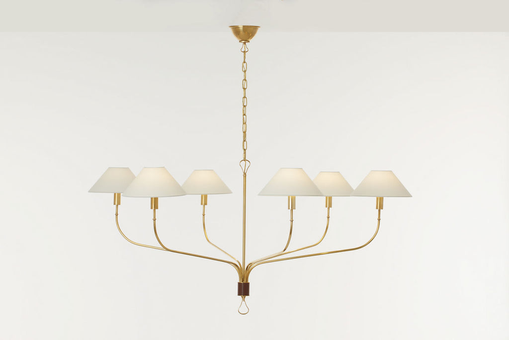 Griffin Grande Tail Chandelier | Hand-Rubbed Antique Brass and Saddle Leather | Linen Shades