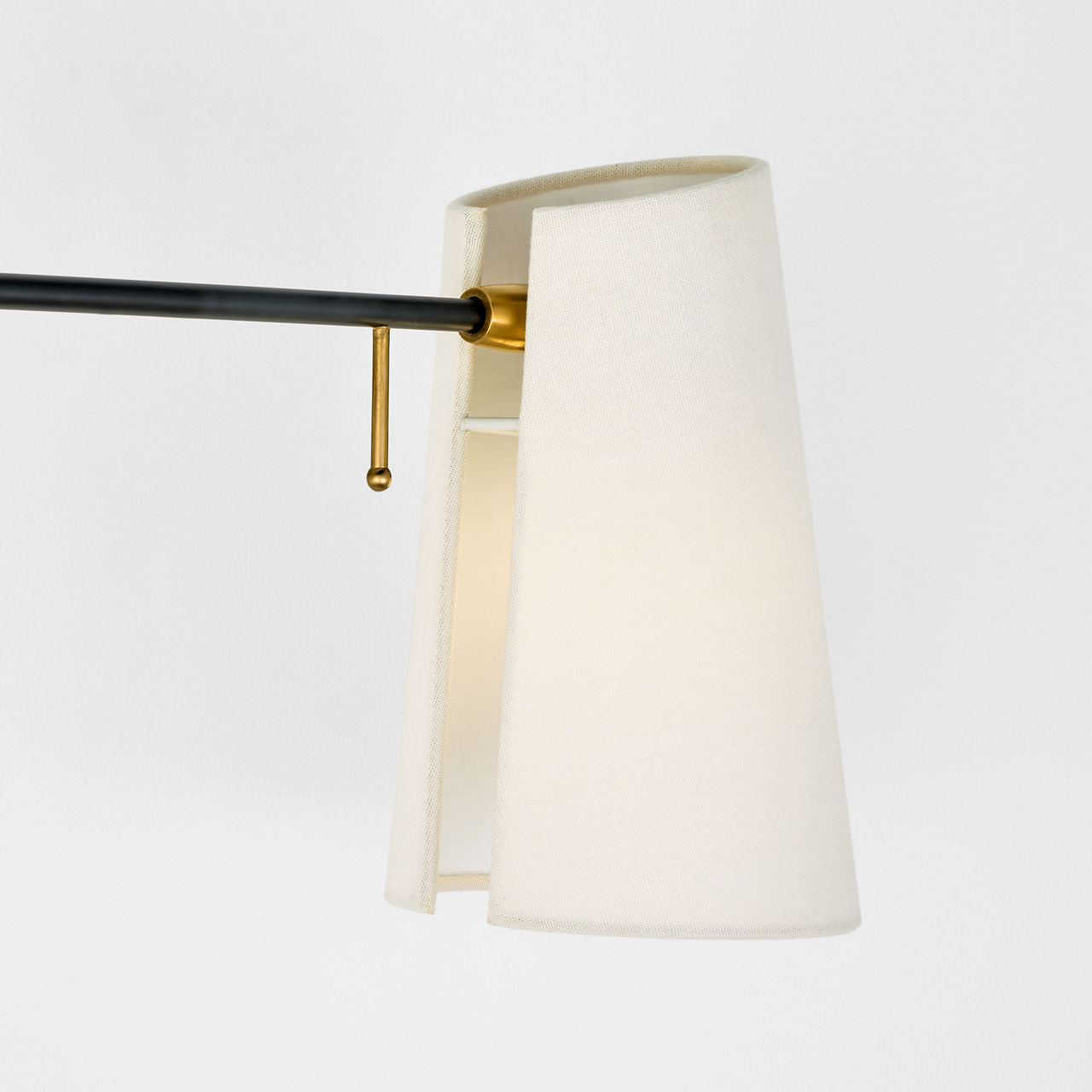 Keil Swing Arm Wall Light | Hand-Rubbed Antique Brass and Black | Linen Shade