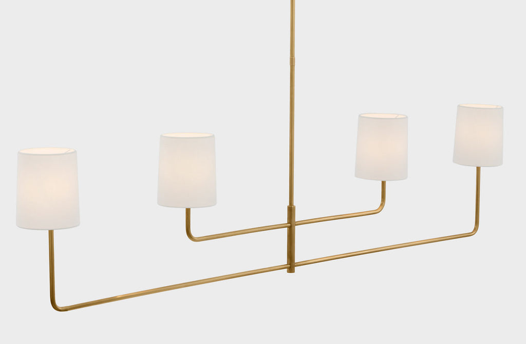 Go Lightly 70" Four Light Linear Chandelier | Soft Brass | Linen Shades