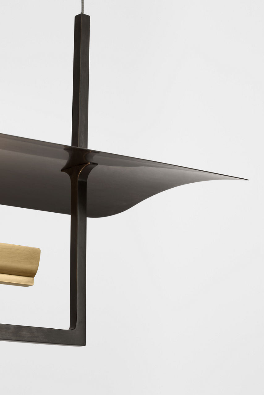 Tristan 54" Reflector Linear Chandelier | Bronze and Hand-Rubbed Antique Brass