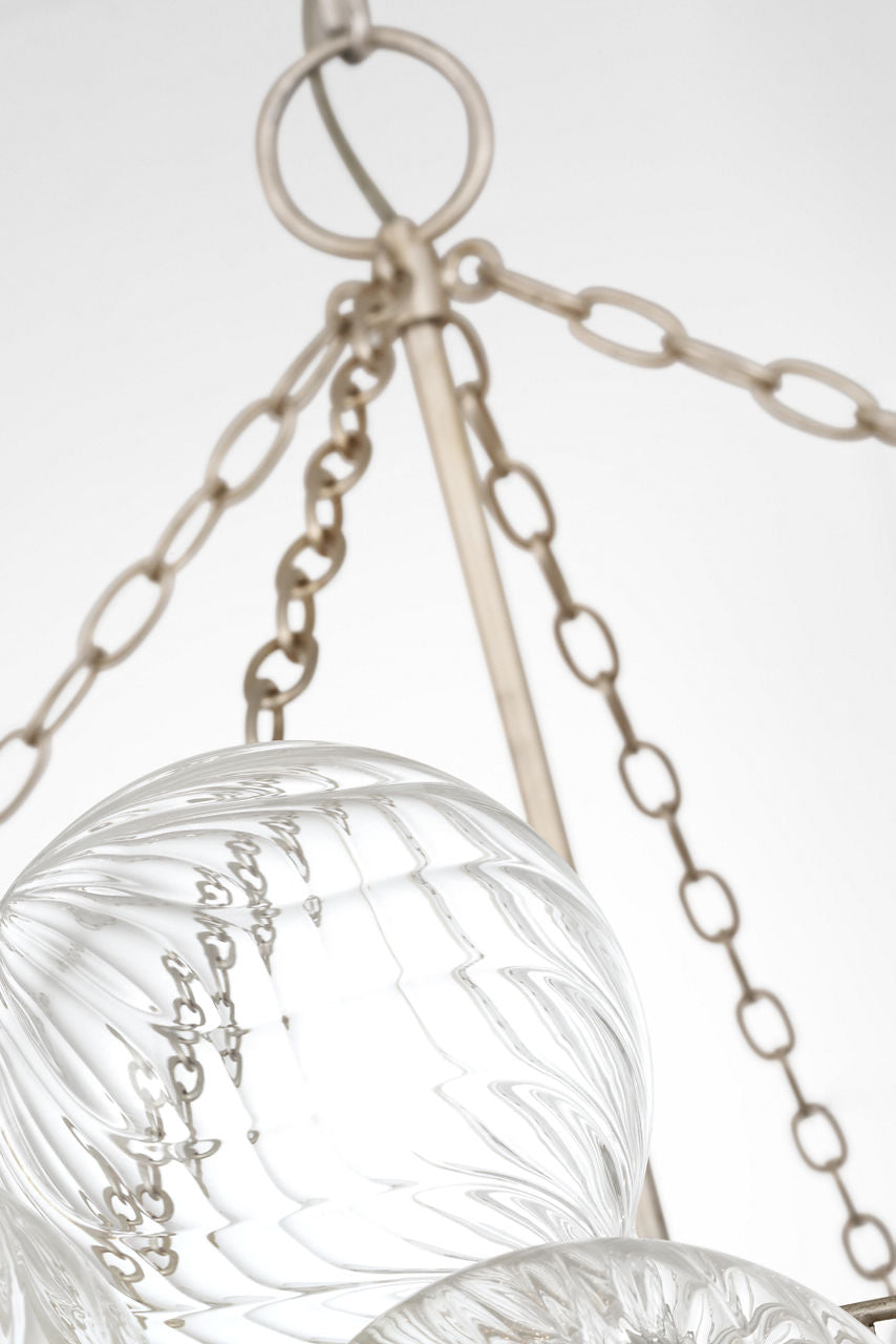 Talia 56" Chandelier | Burnished Silver Leaf and Clear Swirled Glass
