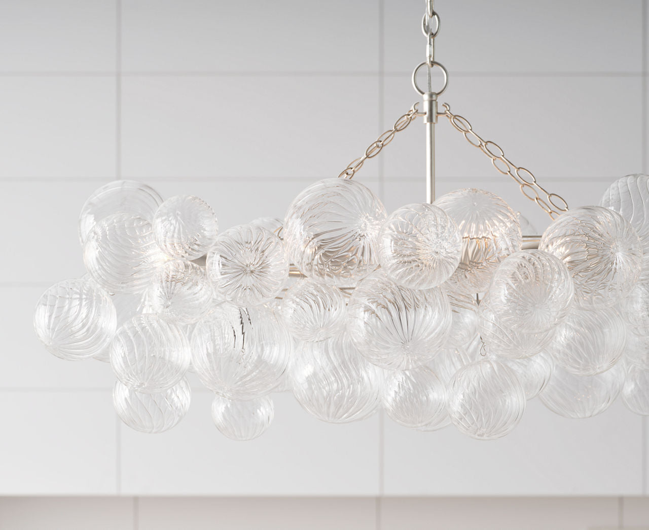 Talia Medium Linear Chandelier | Burnished Silver Leaf | Clear Swirled Glass
