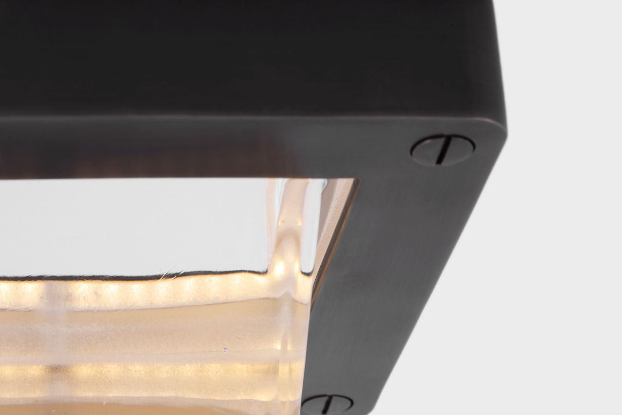 Rolland 5" Solitaire Flush Mount | Bronze and Clear Glass