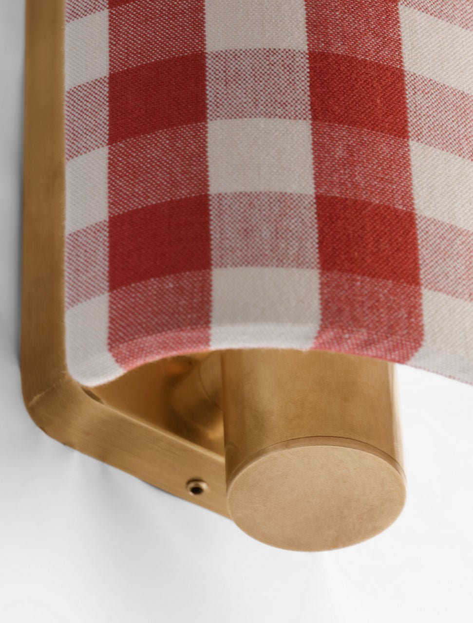 Maeve 8" Shield Sconce | Hand-Rubbed Antique Brass | Schumacher Red Elton Check Shield
