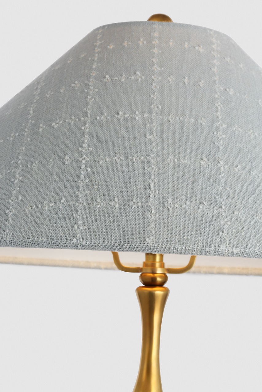 Romero Medium Table Lamp | Hand-Rubbed Antique Brass | Schumacher 19" Sky Elin Check Flare Shade