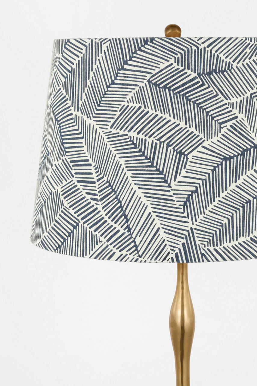 Romero Medium Table Lamp | Hand-Rubbed Antique Brass | Schumacher 16" Navy Abstract Leaf Empire Shade