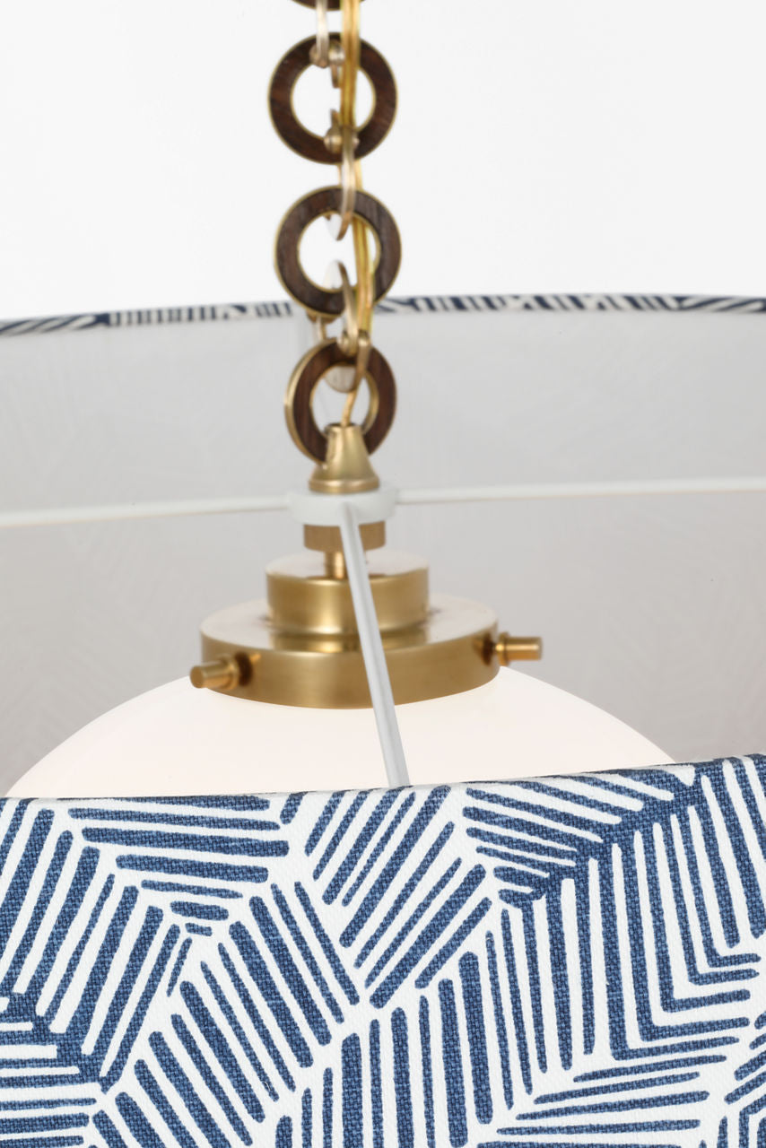 Evelyn 33" Hanging Shade | Hand-Rubbed Antique Brass and Natural Oak | Schumacher Navy Abstract Leaf Shade