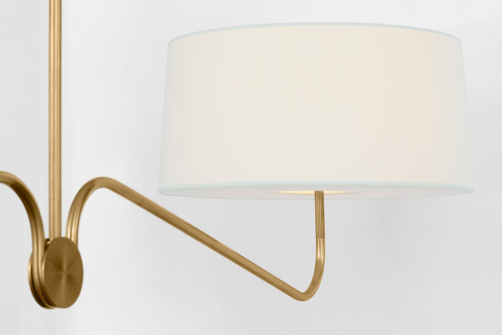 Canto 68" Linear Chandelier | Hand-Rubbed Antique Brass | Linen Shades