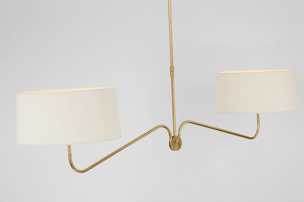 Canto 68" Linear Chandelier | Hand-Rubbed Antique Brass | Linen Shades